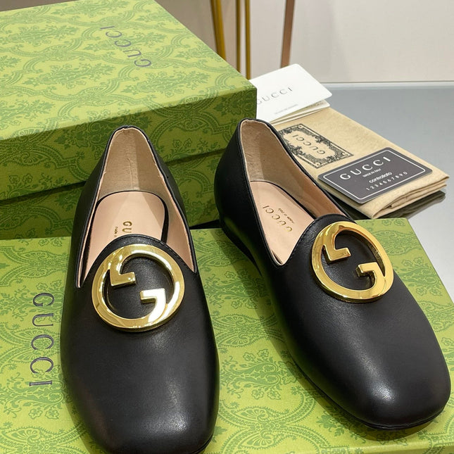 BLONDIE LOGO-PLAQUE LOAFERS IN BLACK CALFSKIN WITH GOLD HARDWARE