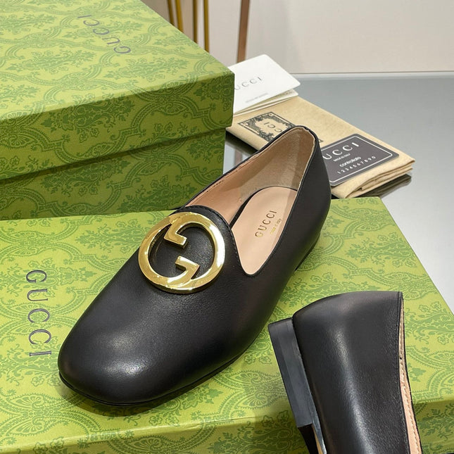 BLONDIE LOGO-PLAQUE LOAFERS IN BLACK CALFSKIN WITH GOLD HARDWARE