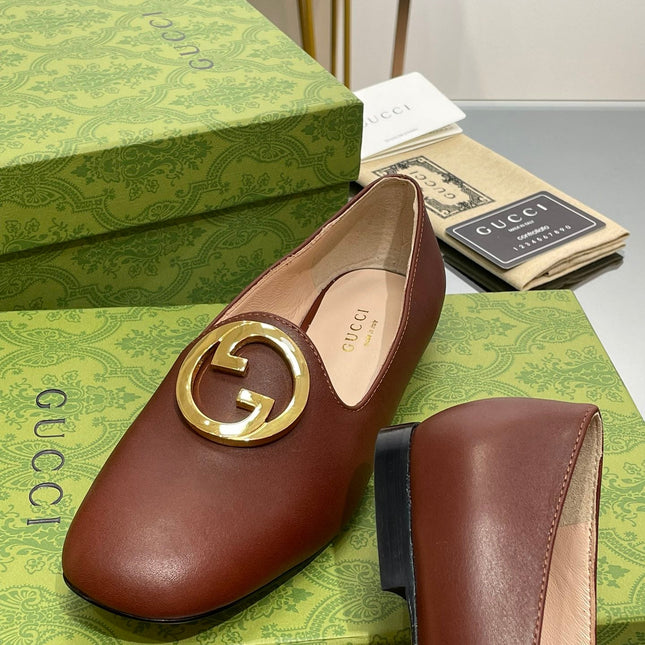 BLONDIE LOGO-PLAQUE LOAFERS IN SYRUP BROWN CALFSKIN WITH GOLD HARDWARE