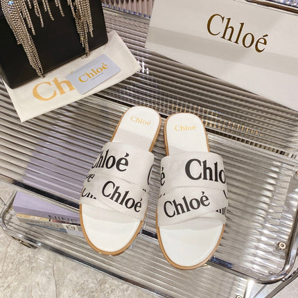 WOODY SLIPPER IN WHITE MIX BLACK CANVAS