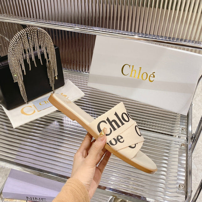 WOODY SLIPPER IN BEIGE MIX BLACK CANVAS