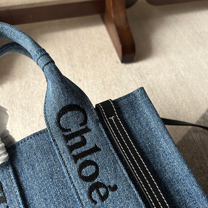 SMALL WOODY TOTE BAG 26.5 IN BLUE DENIM BLACK CALFSKIN