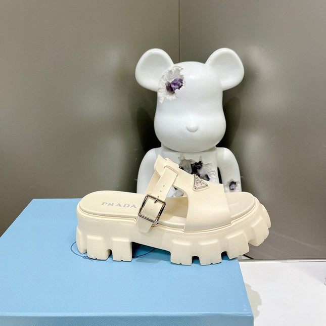 MONOLITH SLIPPER SANDALS IN BEIGE RUBBER