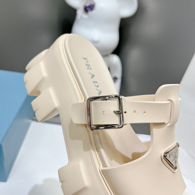 MONOLITH SLIPPER SANDALS IN BEIGE RUBBER