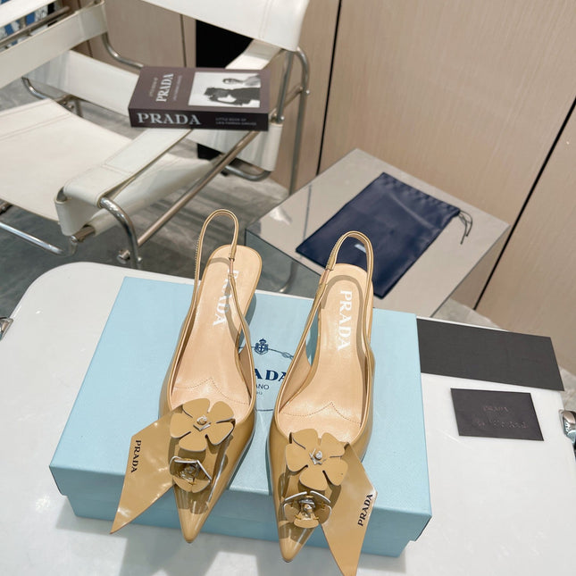 SLINGBACK KITTEN HEEL IN TORTILLA BROWN SHINY CALFSKIN ATTACHED FLOWERS