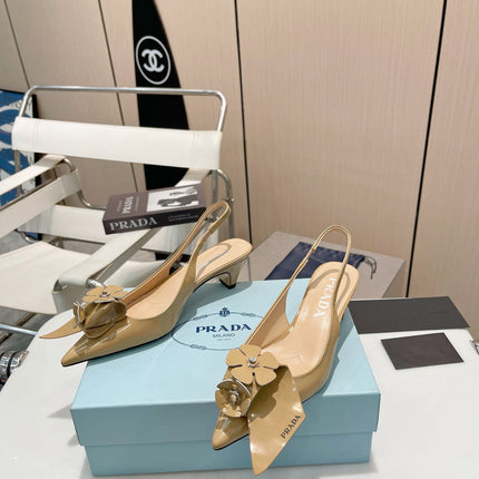 SLINGBACK KITTEN HEEL IN TORTILLA BROWN SHINY CALFSKIN ATTACHED FLOWERS