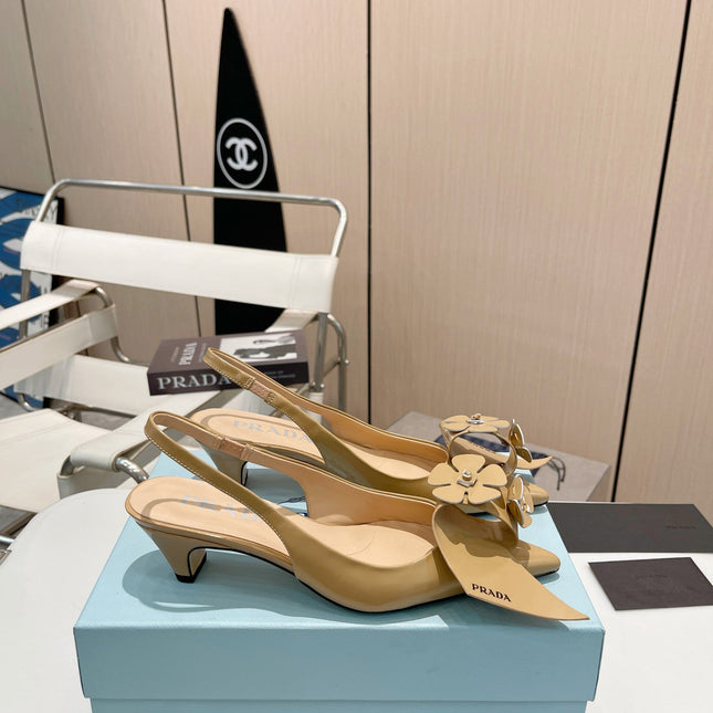 SLINGBACK KITTEN HEEL IN TORTILLA BROWN SHINY CALFSKIN ATTACHED FLOWERS