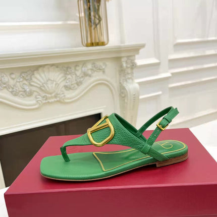 THONG SANDALS IN EMERALD GREEN CALFSKIN WITH GOLD LOGO