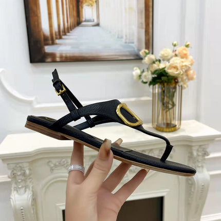 THONG SANDALS IN BLACK CALFSKIN WITH GOLD LOGO