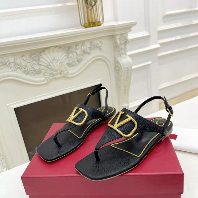 THONG SANDALS IN BLACK CALFSKIN WITH GOLD LOGO