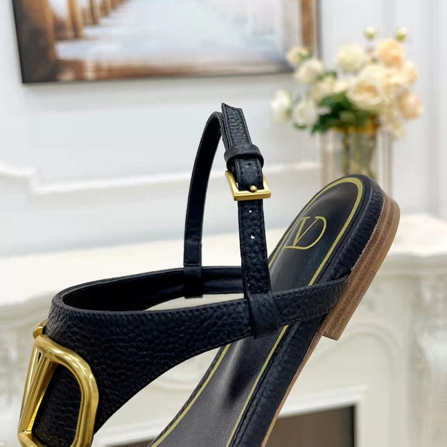 THONG SANDALS IN BLACK CALFSKIN WITH GOLD LOGO