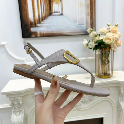 THONG SANDALS IN THISTLE PURPLE CALFSKIN WITH GOLD LOGO