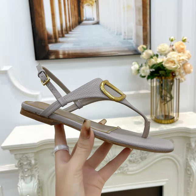 THONG SANDALS IN THISTLE PURPLE CALFSKIN WITH GOLD LOGO