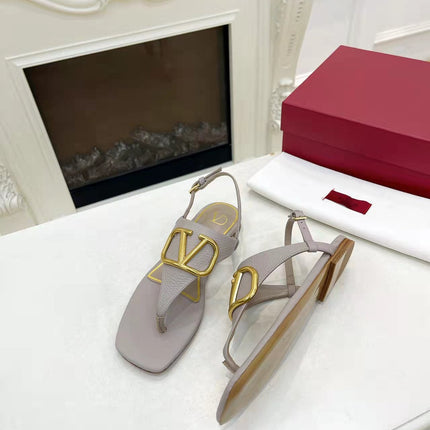 THONG SANDALS IN THISTLE PURPLE CALFSKIN WITH GOLD LOGO