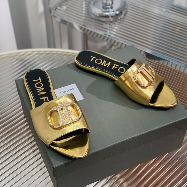 FLAT SLIDE IN GOLD METALLIC CALFSKIN