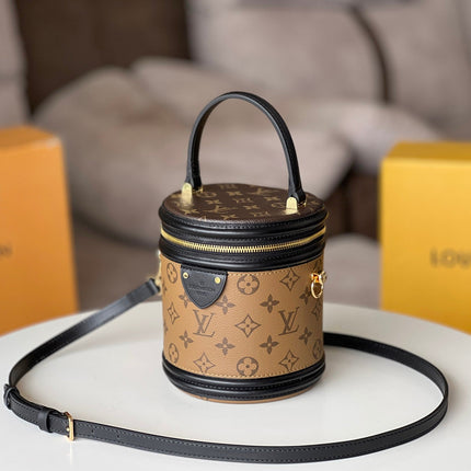 LV 25S PETIT NOE  16 IN BROWN MONOGRAM COATED CANVAS LEATHER TRIM BLACK