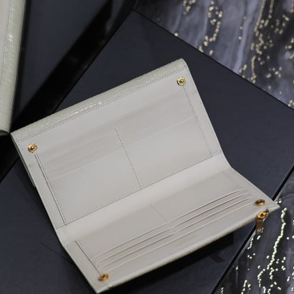 UPTOWN WALLET 21 IN WHITE CROCODILE PATTERN CALFSKIN GOLD LOGO