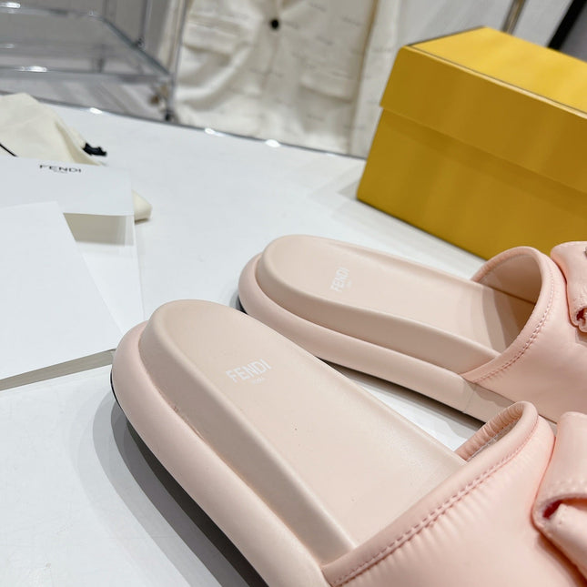 FENDI BAGUETTE SLIPPERS IN PASTEL PINK LAMBSKIN WITH GOLD HARDWARE