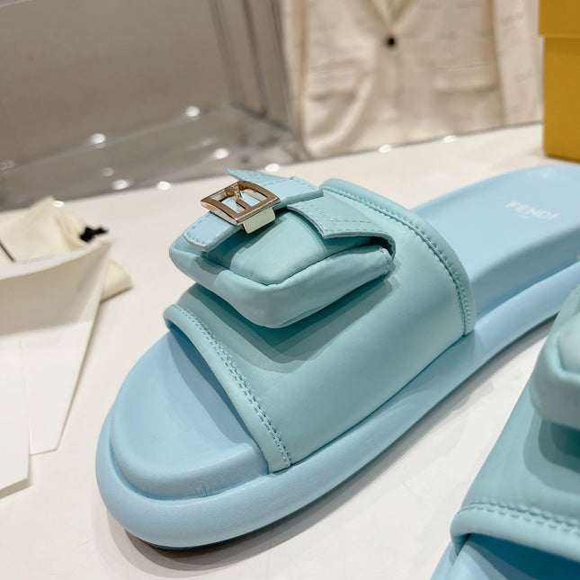 FENDI BAGUETTE SLIPPERS IN SKY BLUE LAMBSKIN WITH GOLD HARDWARE