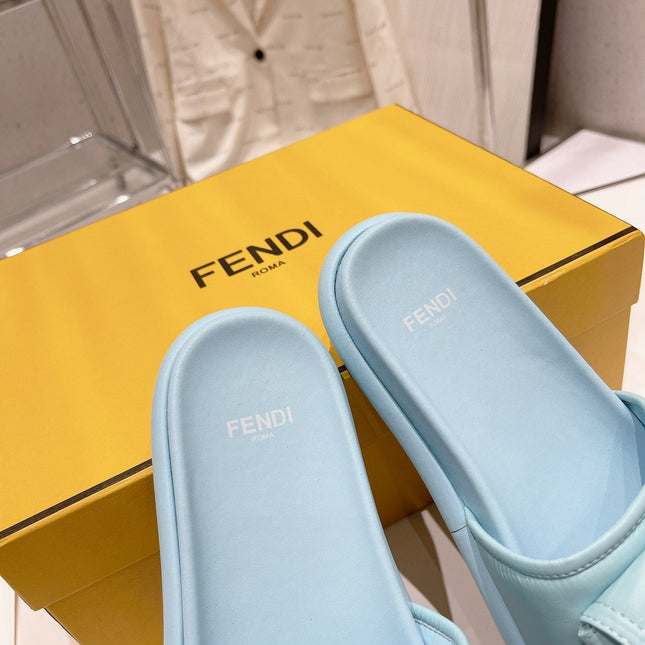 FENDI BAGUETTE SLIPPERS IN SKY BLUE LAMBSKIN WITH GOLD HARDWARE