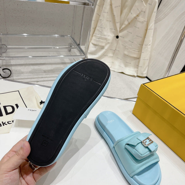 FENDI BAGUETTE SLIPPERS IN SKY BLUE LAMBSKIN WITH GOLD HARDWARE
