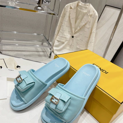 FENDI BAGUETTE SLIPPERS IN SKY BLUE LAMBSKIN WITH GOLD HARDWARE