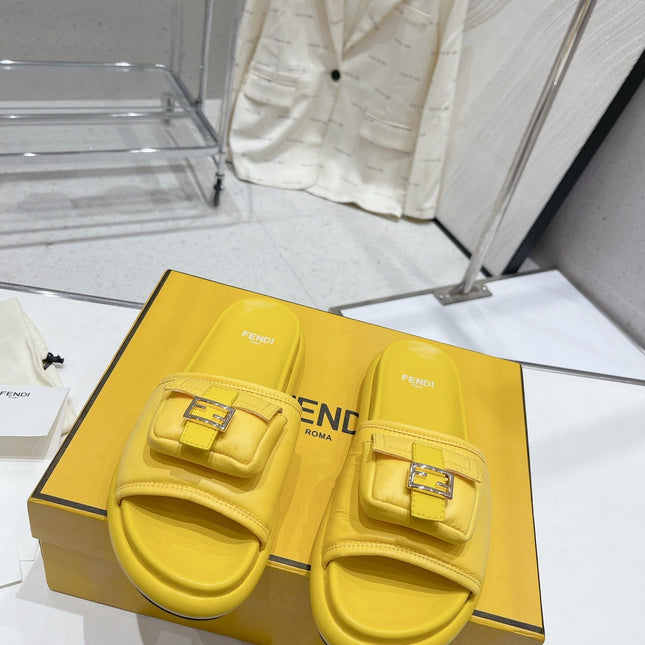 FENDI BAGUETTE SLIPPERS IN NAPLES YELLOW LAMBSKIN WITH GOLD HARDWARE