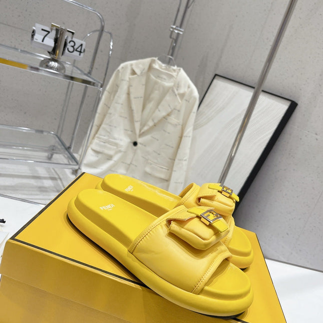 FENDI BAGUETTE SLIPPERS IN NAPLES YELLOW LAMBSKIN WITH GOLD HARDWARE