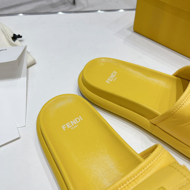 FENDI BAGUETTE SLIPPERS IN NAPLES YELLOW LAMBSKIN WITH GOLD HARDWARE