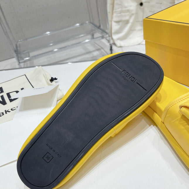 FENDI BAGUETTE SLIPPERS IN NAPLES YELLOW LAMBSKIN WITH GOLD HARDWARE