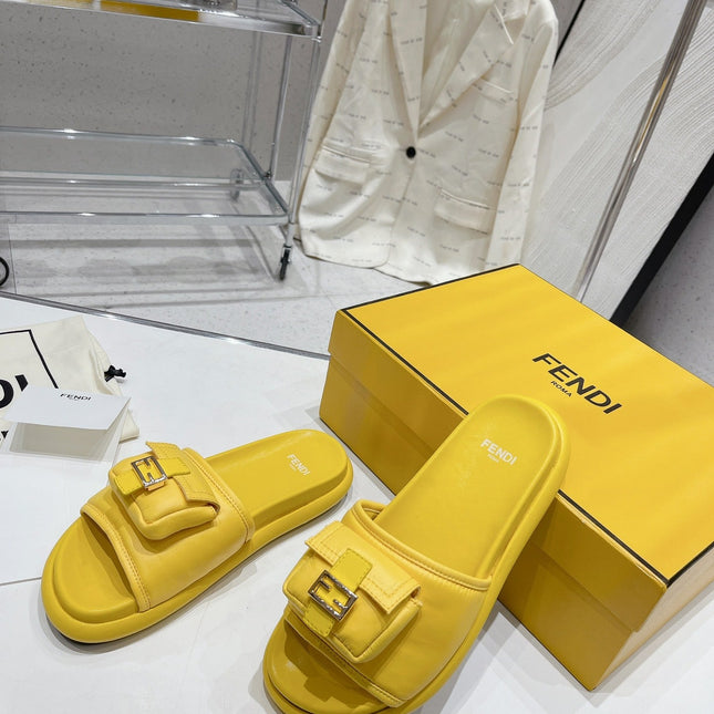 FENDI BAGUETTE SLIPPERS IN NAPLES YELLOW LAMBSKIN WITH GOLD HARDWARE