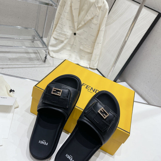 FENDI BAGUETTE SLIPPERS IN BLACK LAMBSKIN WITH GOLD HARDWARE