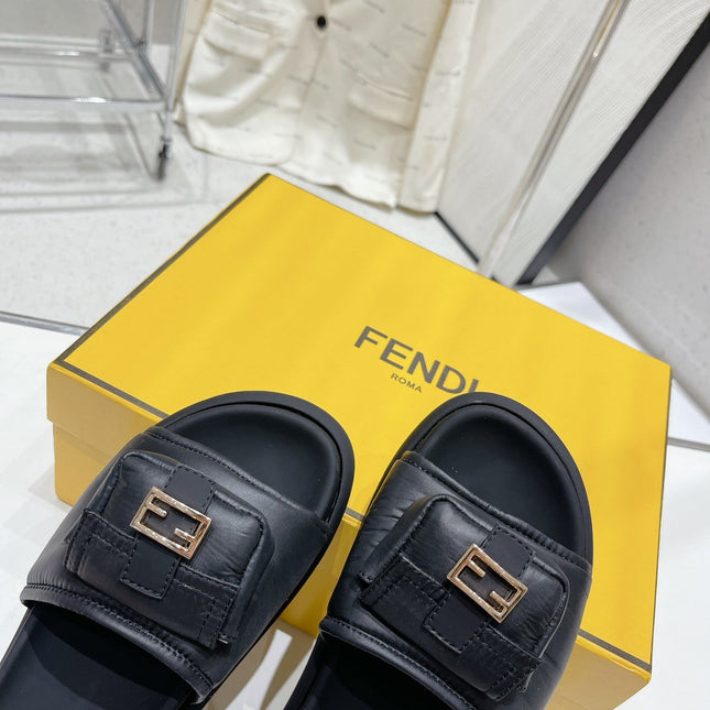 FENDI BAGUETTE SLIPPERS IN BLACK LAMBSKIN WITH GOLD HARDWARE