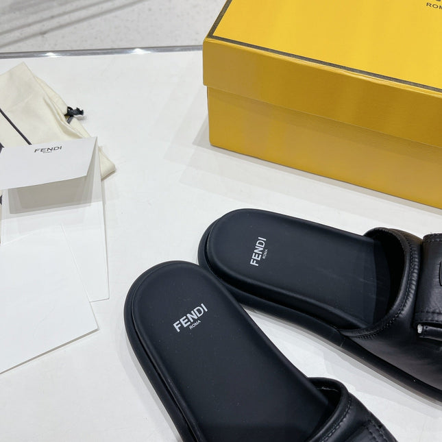 FENDI BAGUETTE SLIPPERS IN BLACK LAMBSKIN WITH GOLD HARDWARE
