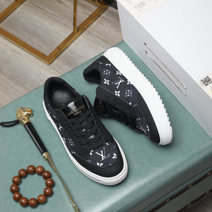 LV TRAINERS IN BLACK CALFSKIN AND MONOGRAM CANVAS