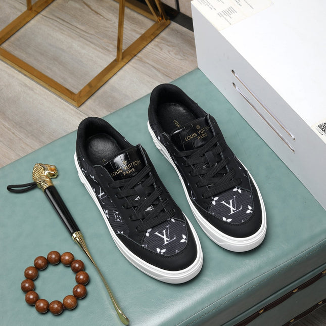 LV TRAINERS IN BLACK CALFSKIN AND MONOGRAM CANVAS