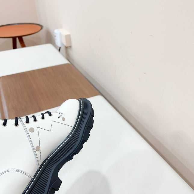 MCQUEEN LEATHER ANKLE BOOT IN WHITE MIX BLACK LAMBSKIN