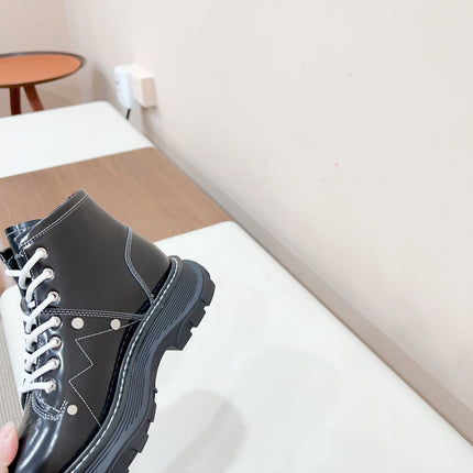 MCQUEEN LEATHER ANKLE BOOT IN BLACK MIX WHITE LAMBSKIN