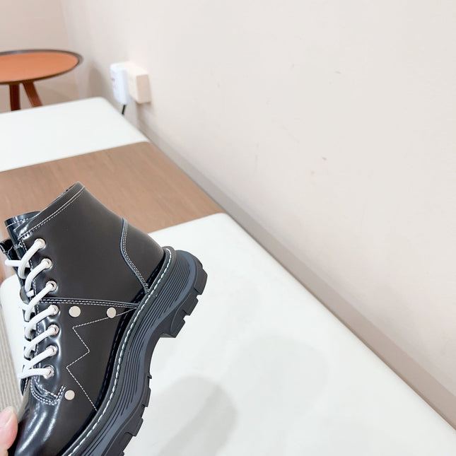 MCQUEEN LEATHER ANKLE BOOT IN BLACK MIX WHITE LAMBSKIN