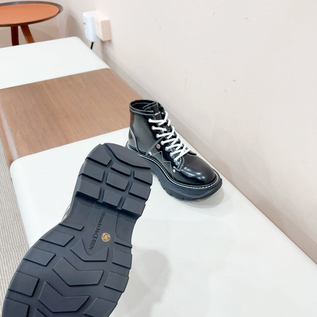 MCQUEEN LEATHER ANKLE BOOT IN BLACK MIX WHITE LAMBSKIN