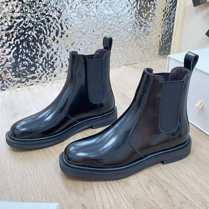 ANKLE BOOTS IN BLACK PATENT CALFSKIN