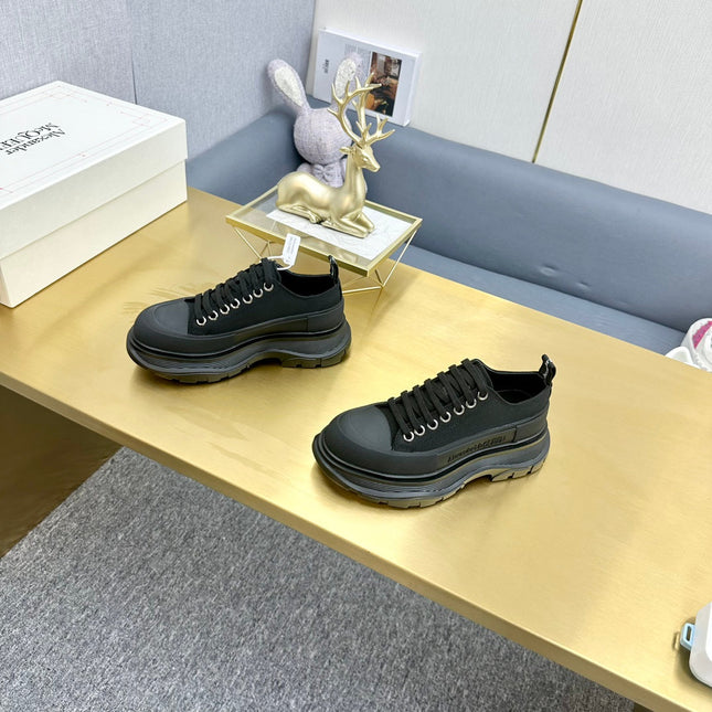 TREAD SLICK LACE UP SNEAKERS IN BLACK CANVAS