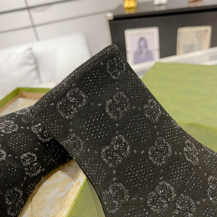 ANKLE BOOTS IN BLACK KNITTED FABRIC