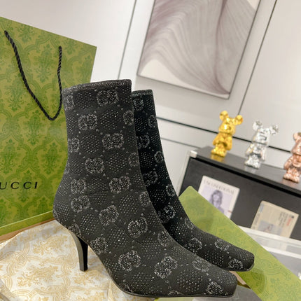 ANKLE BOOTS IN BLACK KNITTED FABRIC