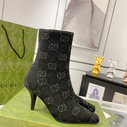 ANKLE BOOTS IN BLACK KNITTED FABRIC