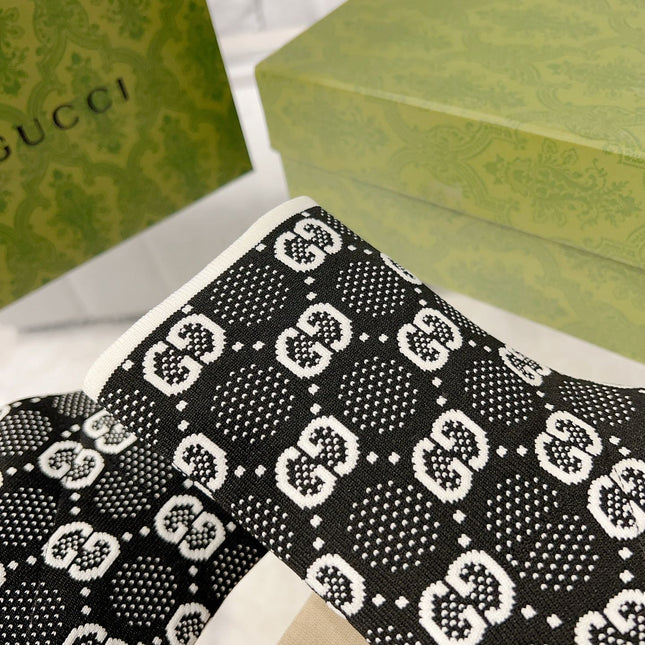 ANKLE BOOTS IN BLACK MIX WHITE KNITTED FABRIC WITH RETRO STYLE