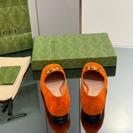 BLONDIE LOGO-PLAQUE LOAFERS IN TIGER ORANGE SUEDE WITH GOLD HARDWARE