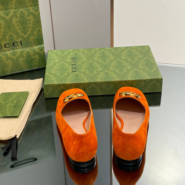 BLONDIE LOGO-PLAQUE LOAFERS IN TIGER ORANGE SUEDE WITH GOLD HARDWARE