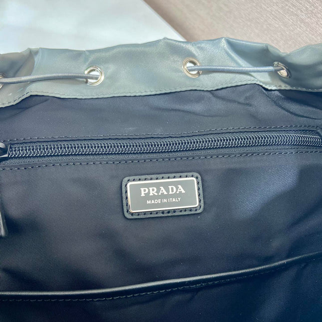 TRIANGLE LOGO BACKPACK 45 IN ASH GRAY RE-NYLON