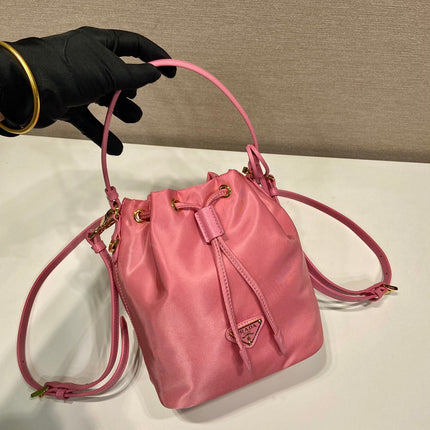 BUCKET BAG 19 IN CANDY PINK RE-NYLON AND SAFFIANO LEATHER HANDLE